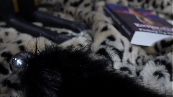 Charlotte Sartre cosplays as catgirl from book 