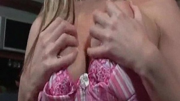 Busty blonde babe titfucks a rock hard cock 