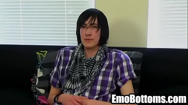 Emo twink Andy Roberts tugs on his rock hard cock 