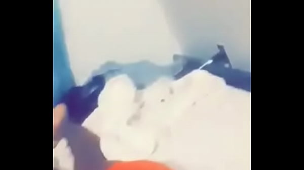 Tiny wiggling her booty from the back