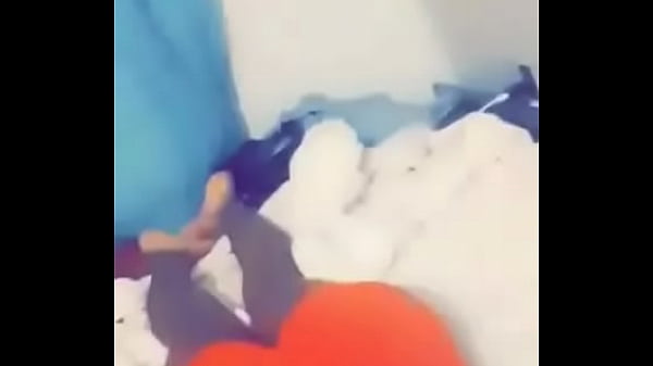 Tiny wiggling her booty from the back