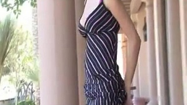 Young beauty flashing her pussy outside 