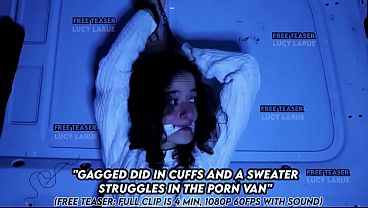 "gagged did in cuffs and a sweater struggles in the porn van"