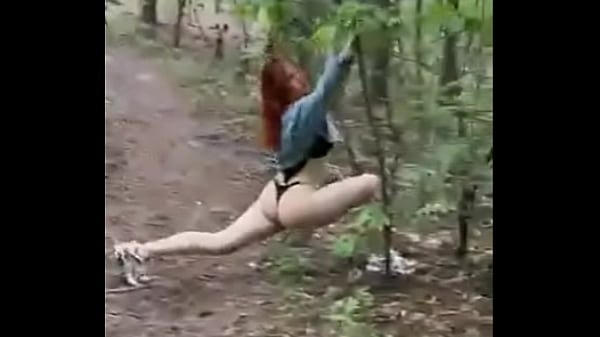 Play MP4 - Redheaded beauty RitaFox walks in the woods and shows her privates