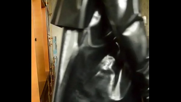 Play MP4 - Guy in black latex coat
