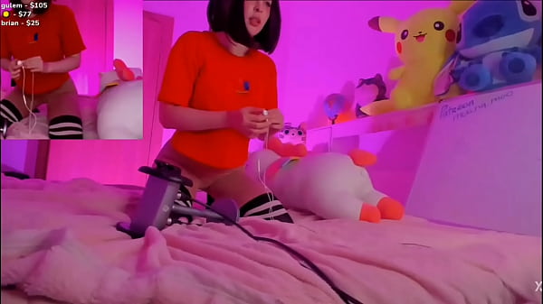 Moona playing with the mic 