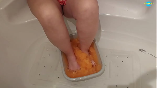 Milf with her feet in slime