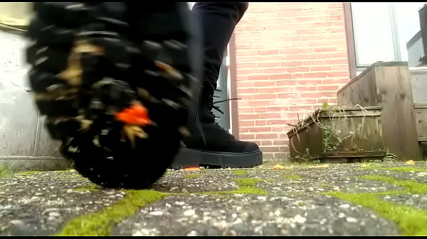 Mistress spitting and crushing fruit