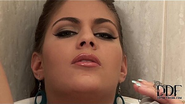 Most beautiful brunette shows her pierced pussy in bathroom 