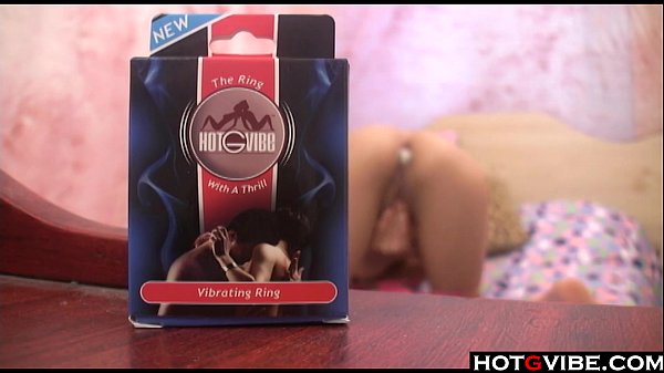 Hot Brunette pleases her pussy whileon the couch