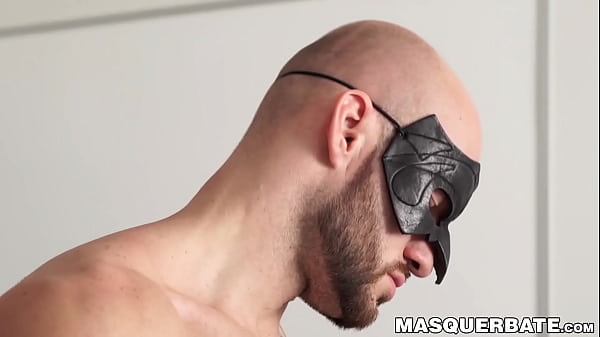 Inked bald hunk David Boss teasing his throbbing cock solo