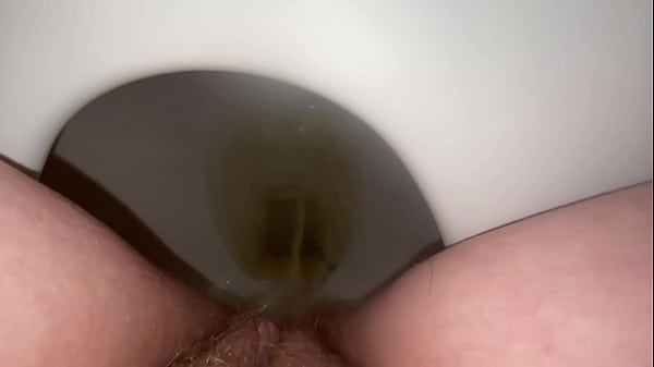 pissing with a fart at the end!