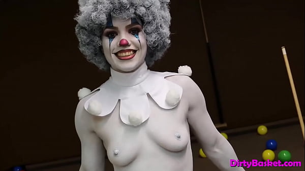 Sexy babe wears clownmakeup and teases