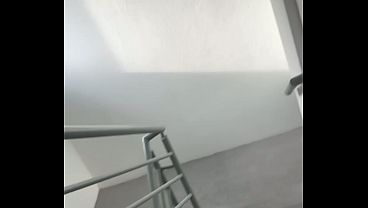 My huge 23cm cock, very hard and squirting cum, is on the stairs of the building where I live 