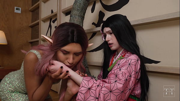 Cute pixie lesbian playing scissor with a Nezuko Kamado. Demon slayer. 