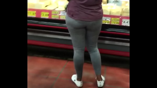 Candid booty at supermarket