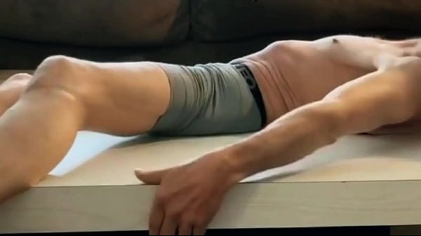 Play MP4 - Stretching in tight underwear with therapy strap on table in underwear