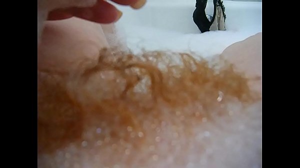 Sexy redhead pornstar annie body takes a hot bubble bath and satisfies her urges for a nice release during it