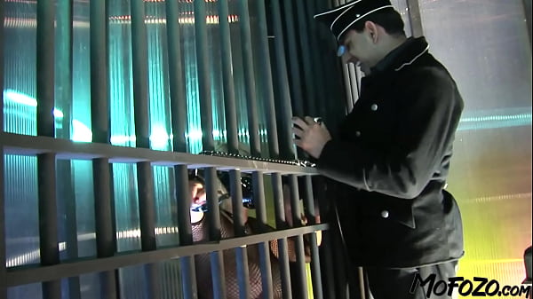 Busty blonde is getting fucked in a cage