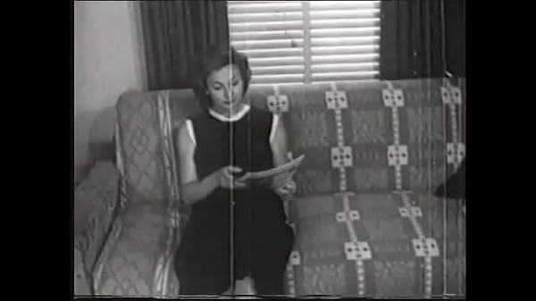 Play MP4 - Sassy MILF with huge tits strips in the living room for an erotic photo shoot