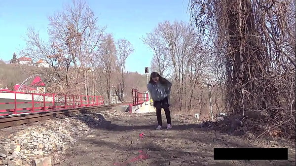 Pee next to the railway line 