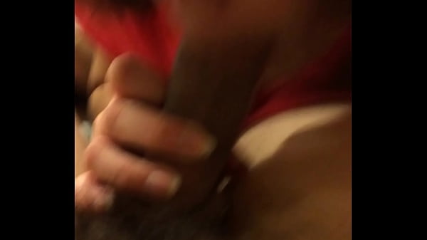 Asian girl sucks hard_on a guy's_dick.