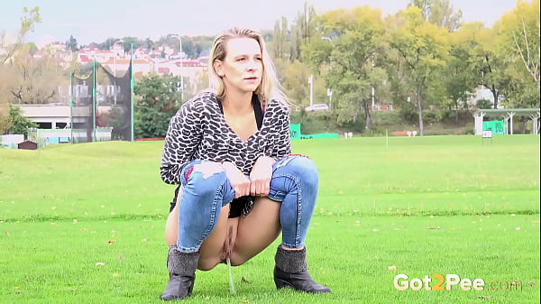 Got2pee Brings Another Desperately Peeing Girl In Out In The Open - Featuring Big Puddle thumbnail