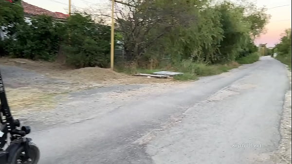 A naked girl rides a scooter through the streets and shockspassers-by nakedon public