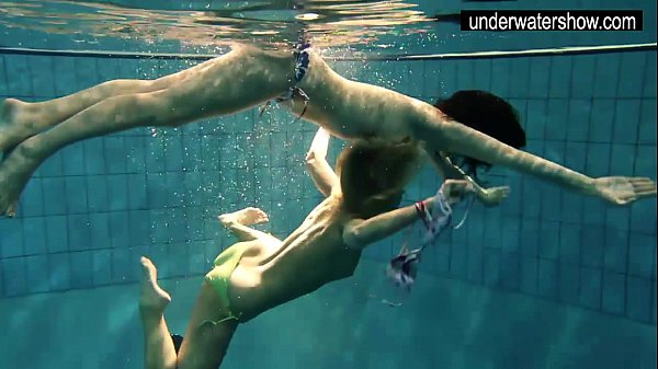 Two_sexy amateurs showing their bodies off under water