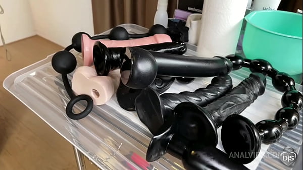 Multiple small dildo insertions on male slave
