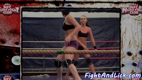 Muscularlesbians wrestling in the boxing ring