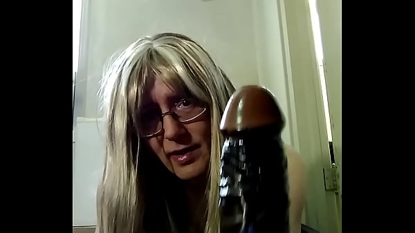 Taking all 9 inches of black dildo 
