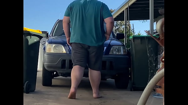 Chubby cums behind car again 