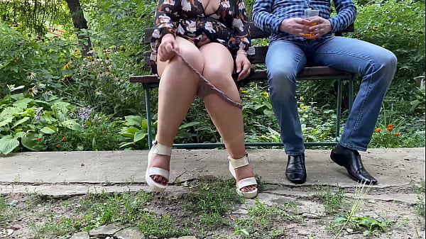 Sexy MILF with gorgeous legs pisses into a_glass and gives it_to a stranger