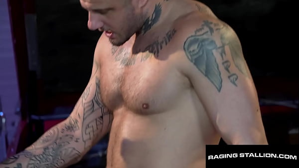 Beefy Mechanics Rails Each Other In Garage 