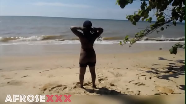 Black_girl getting naked at the beach
