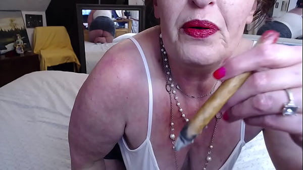 806 first time a cigar heavy makeup and short skirt