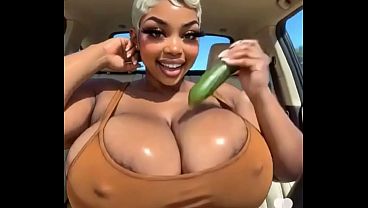 Sexy Ebony Red Bone Titty Fucks A Big Green Pickle thumbnail