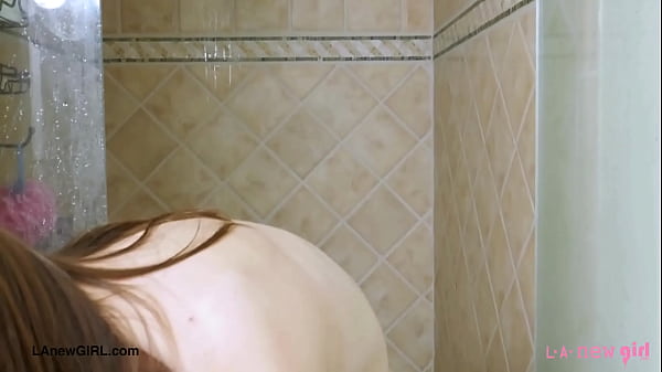 Gorgeous brunette model enjoys a sensual bath