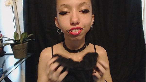 Pink lipstick and a wet messy saliva dripping tongue