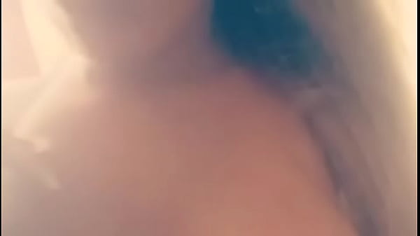 Shows nude body