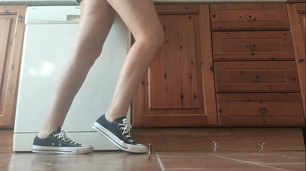 Giantess in sneaker crush tiny man