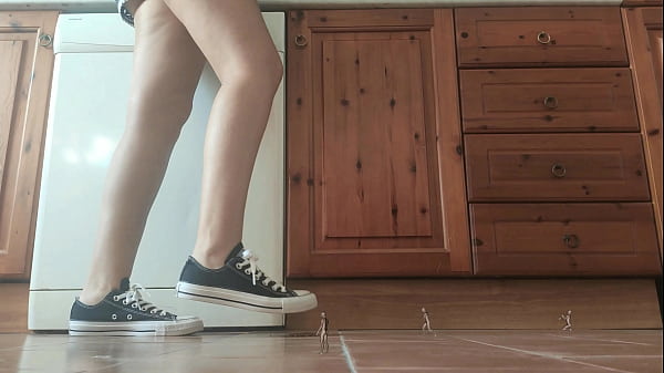 Giantess in sneaker crush tiny man