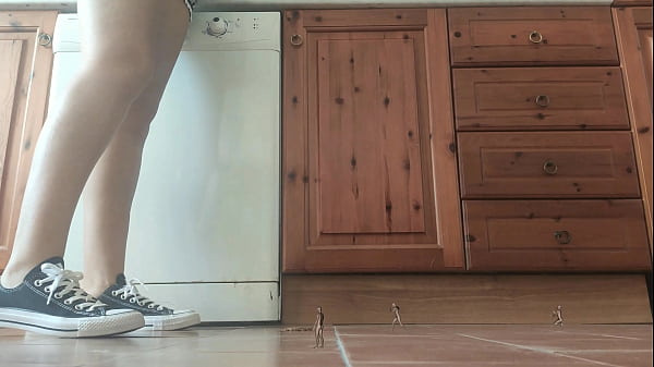 Giantess in sneaker crush tiny man