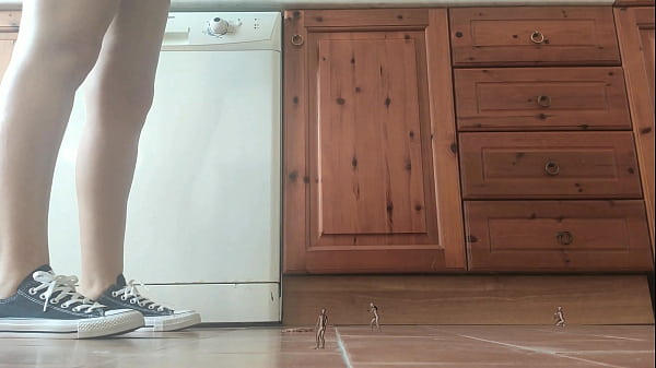 Giantess in sneaker crush tiny man