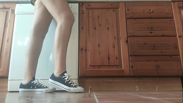 Giantess in sneaker crush tiny man