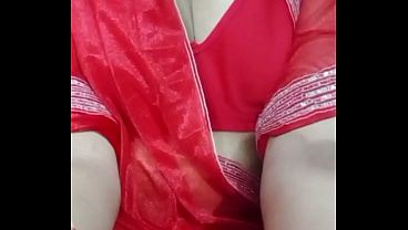 Indian Gay Crossdresser Bottom Gaurisissy pressing and playing with her big boobs in red saree with heavy jwellery 