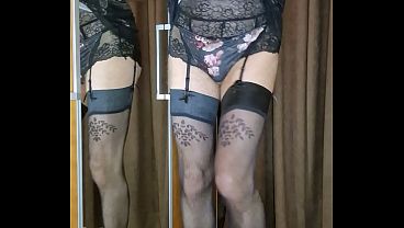 Crossdresser wearing lace lingerie slipdress