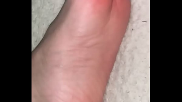 Long white toes wiggling up close looking very suckable 