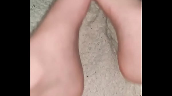 Long white toes wiggling up close looking very suckable